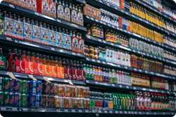 Supermarket shelf with various drinks